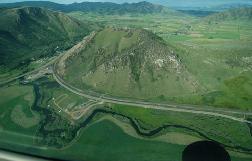 Above Lava – the Portneuf is flowing south along the bottom of this picture and then turns right and flows west through the gap between the hills in this picture.