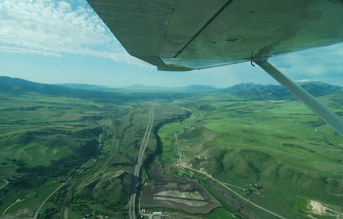 Looking south at Marsh Creek (right side of basalt cliffs) and the Portneuf River (left of basalt cliffs) from Inkom